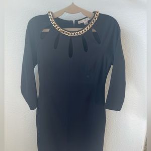 Boston Proper  black sleek dress w cut outs and gold trimmed collar